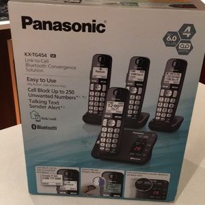 Cordless phone with 4 headsets,box never opened